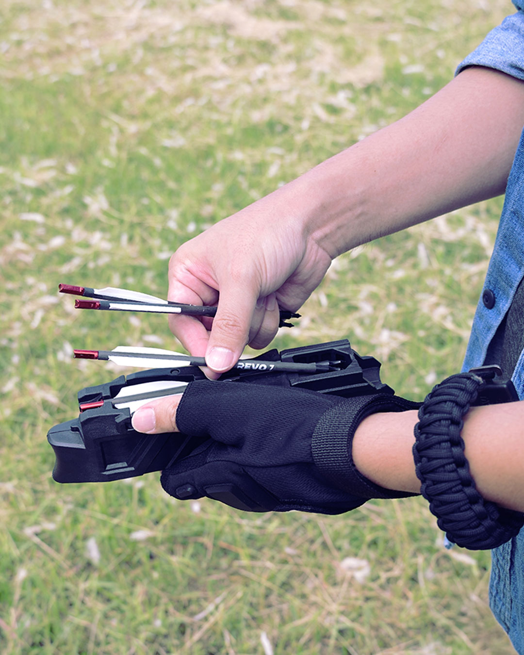 Loading bolts into the REVO 7 crossbow magazine