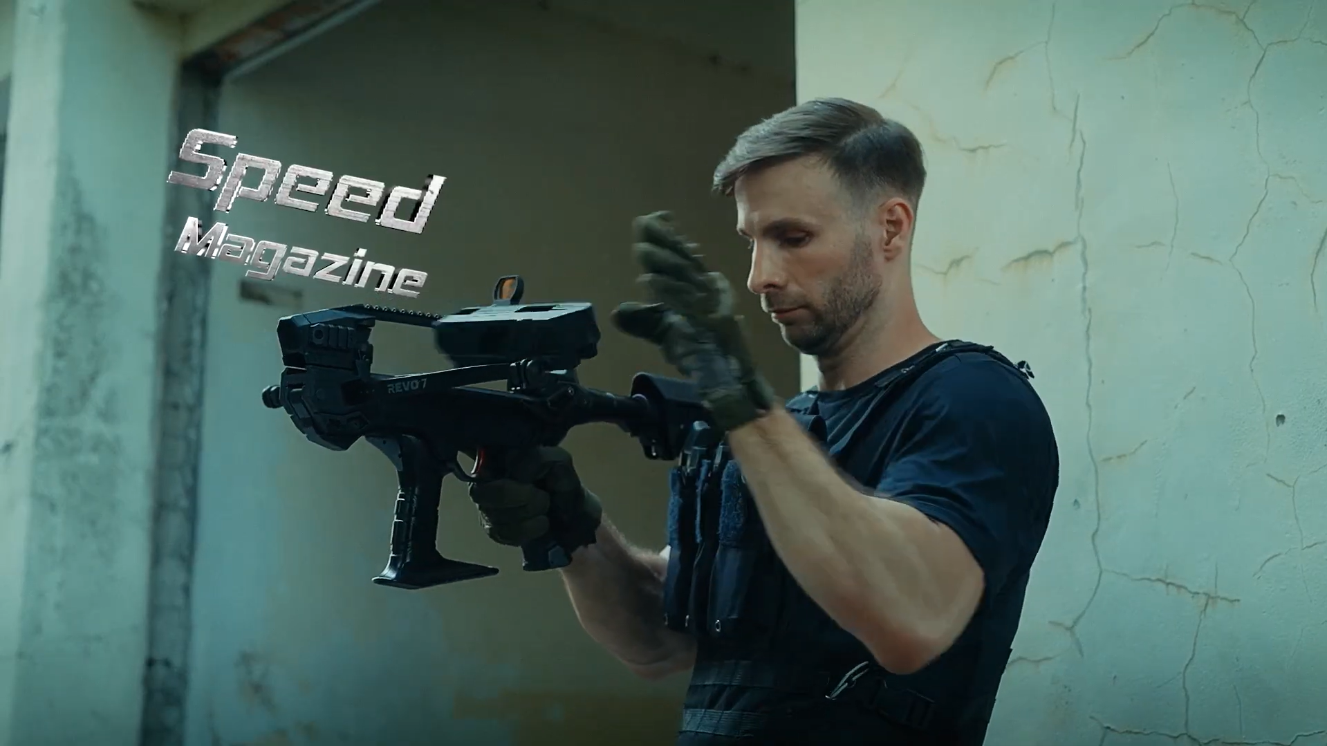 Shooter swapping the REVO 7 speed magazine